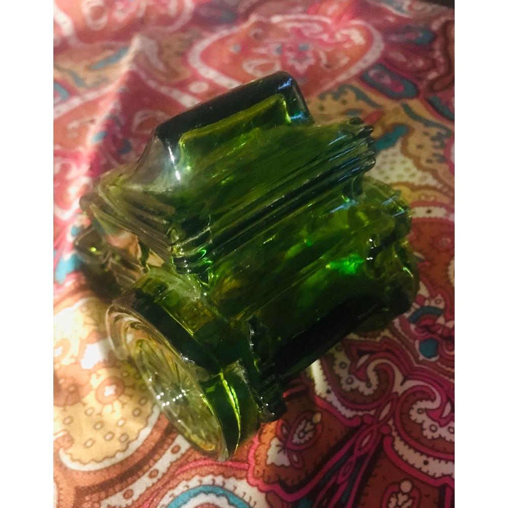 Avon green glass aftershave bottle